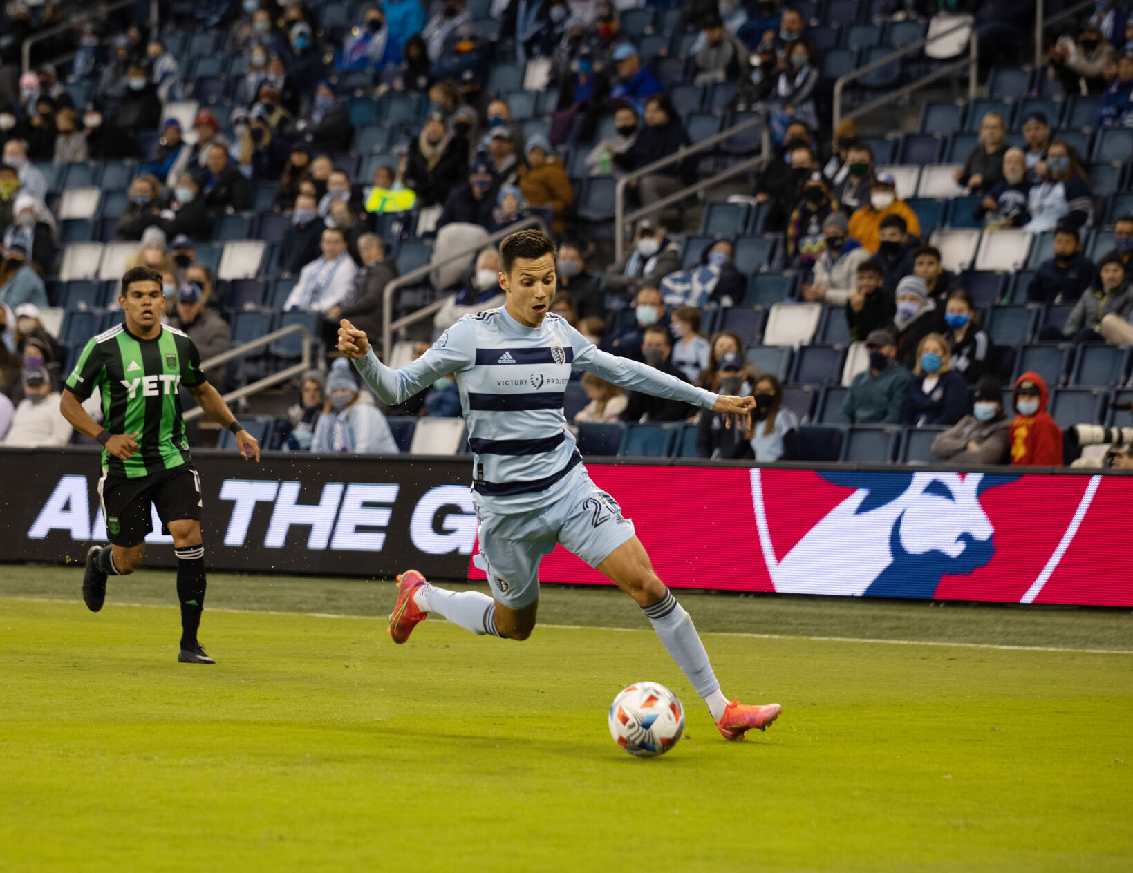 Daniel Salloi makes a break down the field